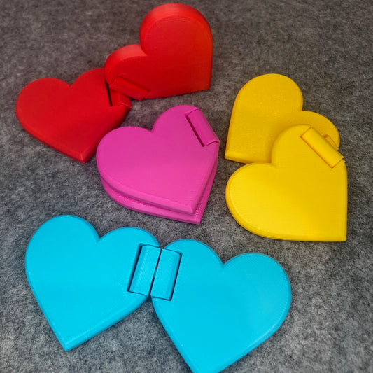 Flip and slide heart fidgets